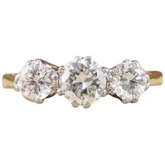 Vintage 1930s Three-Stone Diamond Ring in 18 Carat Yellow Gold and Platinum