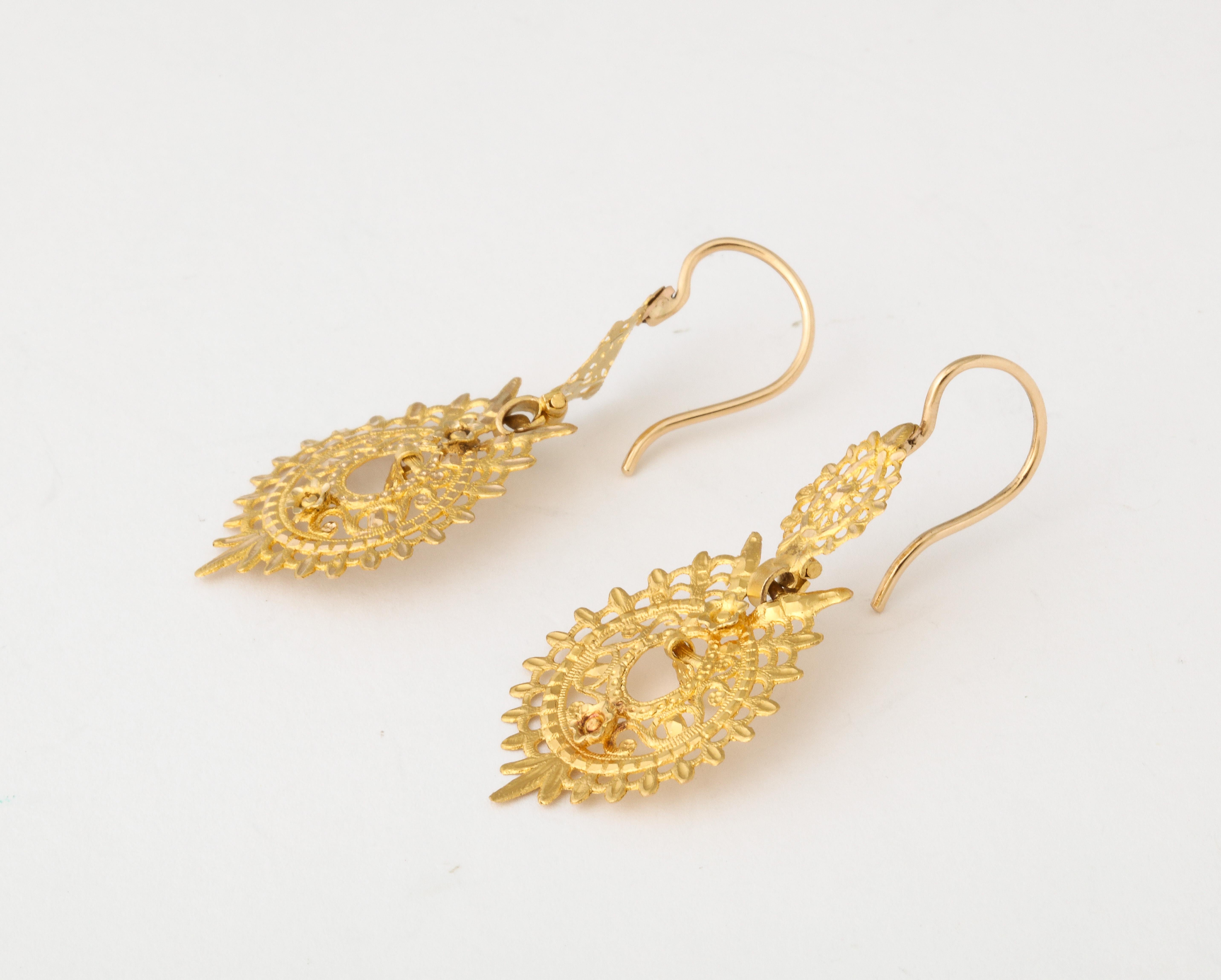 gold earrings hung with pearls sank with a spanish