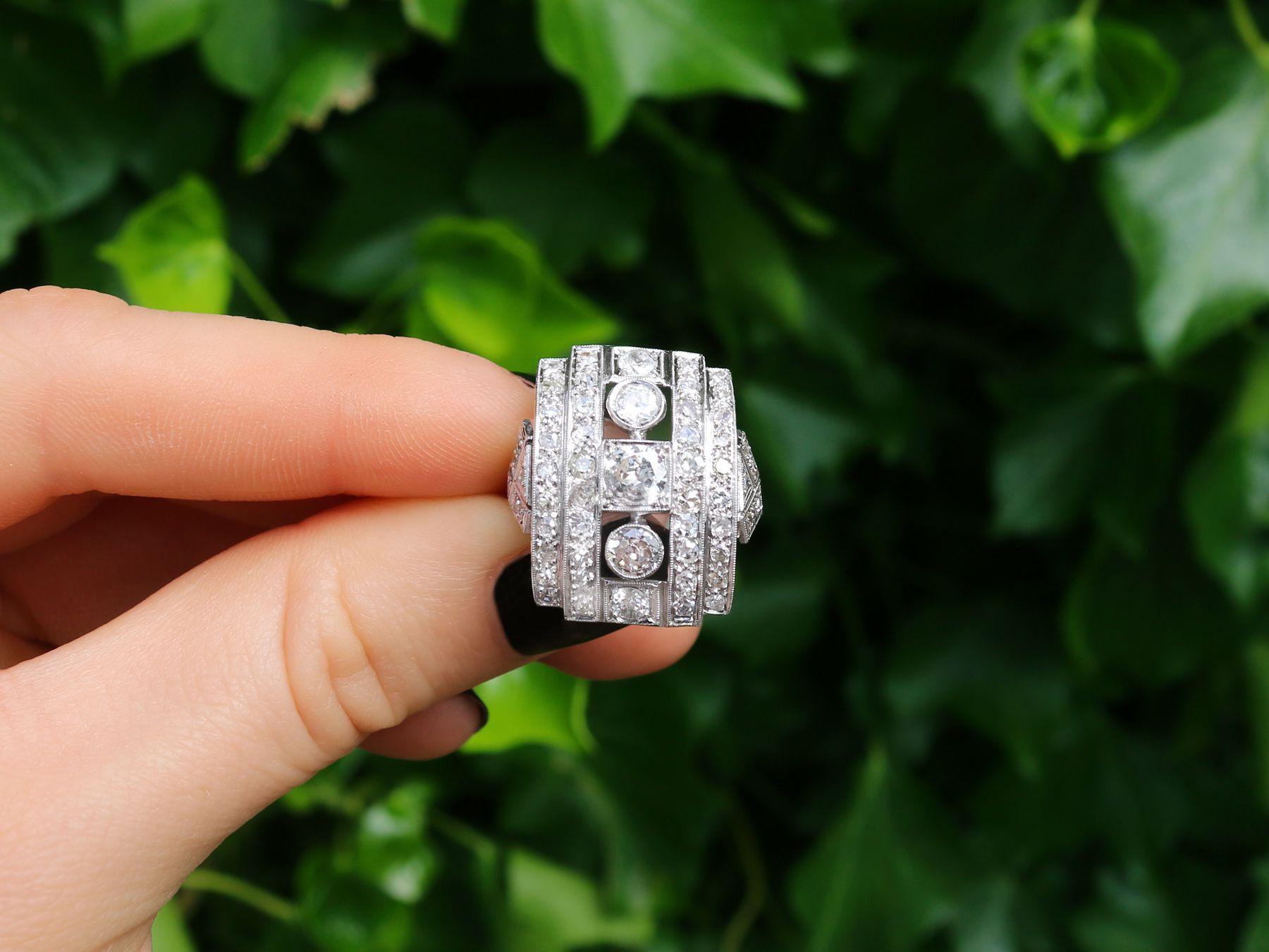 A stunning vintage 1940s Art Deco 2.66 carat diamond and platinum cocktail ring; part of our diverse vintage jewelry and estate jewelry collections.

This stunning, fine and impressive vintage Art Deco diamond ring has been crafted in platinum.

The