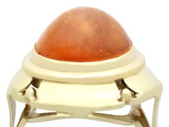 Vintage 1940s 4.61 Carat Cabochon Cut Amber and Yellow Gold Cocktail Ring