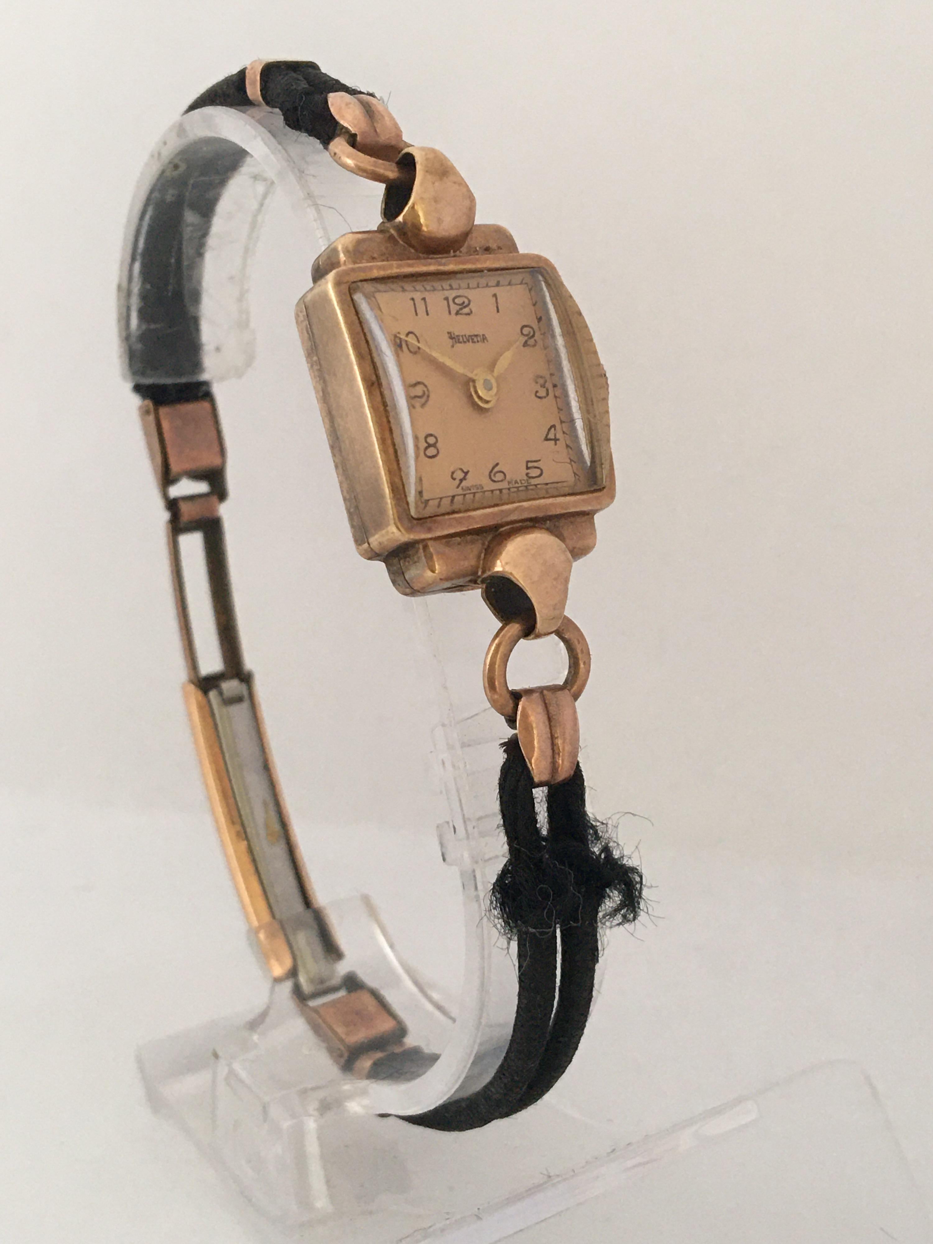 This beautiful pre-owned vintage gold hand winding watch is working and it is ticking well but I cannot guarantee the time accuracy. visible signs of ageing and wear. The strap is a bit worn as shown. Please study the images carefully as part of the
