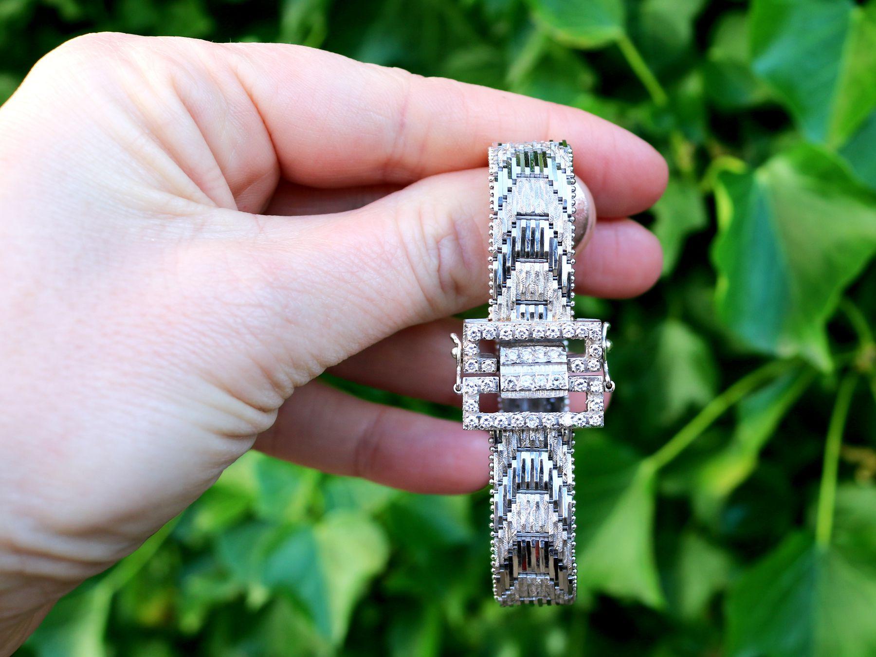 A stunning Art Deco Style 1.20 Carat diamond and 18 karat white gold buckle bracelet; part of our diverse jewelry and estate jewelry collections

This stunning, fine and impressive Art Deco bracelet has been crafted in 18k white gold.

The bracelet