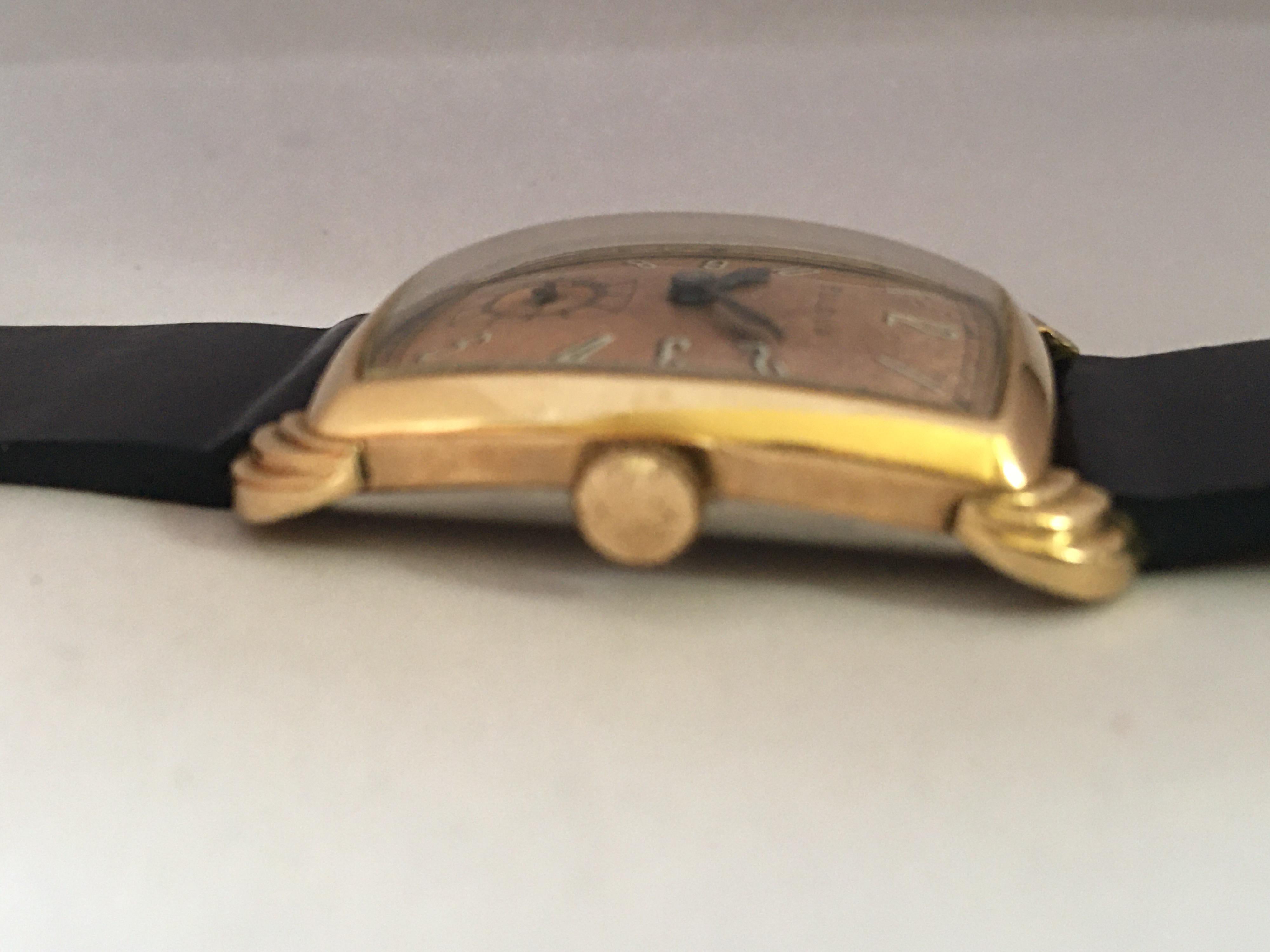Women's or Men's Vintage 1940s Bulova Rectangular Curved Rolled Gold and Stainless Steel Watch
