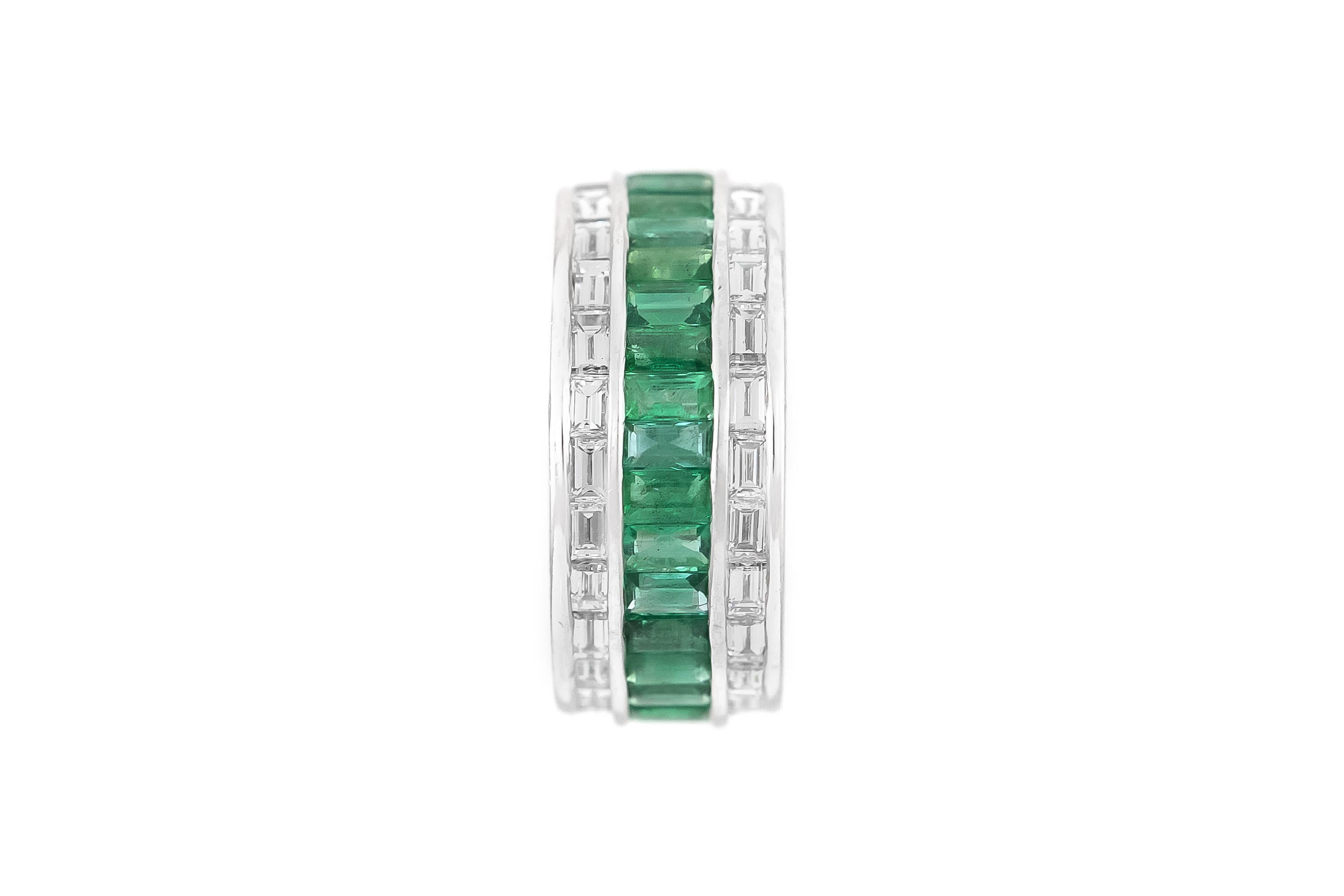 Finely crafted in platinum with channel-set Baguette cut Emeralds weighing a total of approximately 4.00 carats and channel-set Baguette cut Diamonds weighing a total of approximately 3.00 carats, H-I color, VS1-VS2 clarity.
Circa 1940s
Size 6
