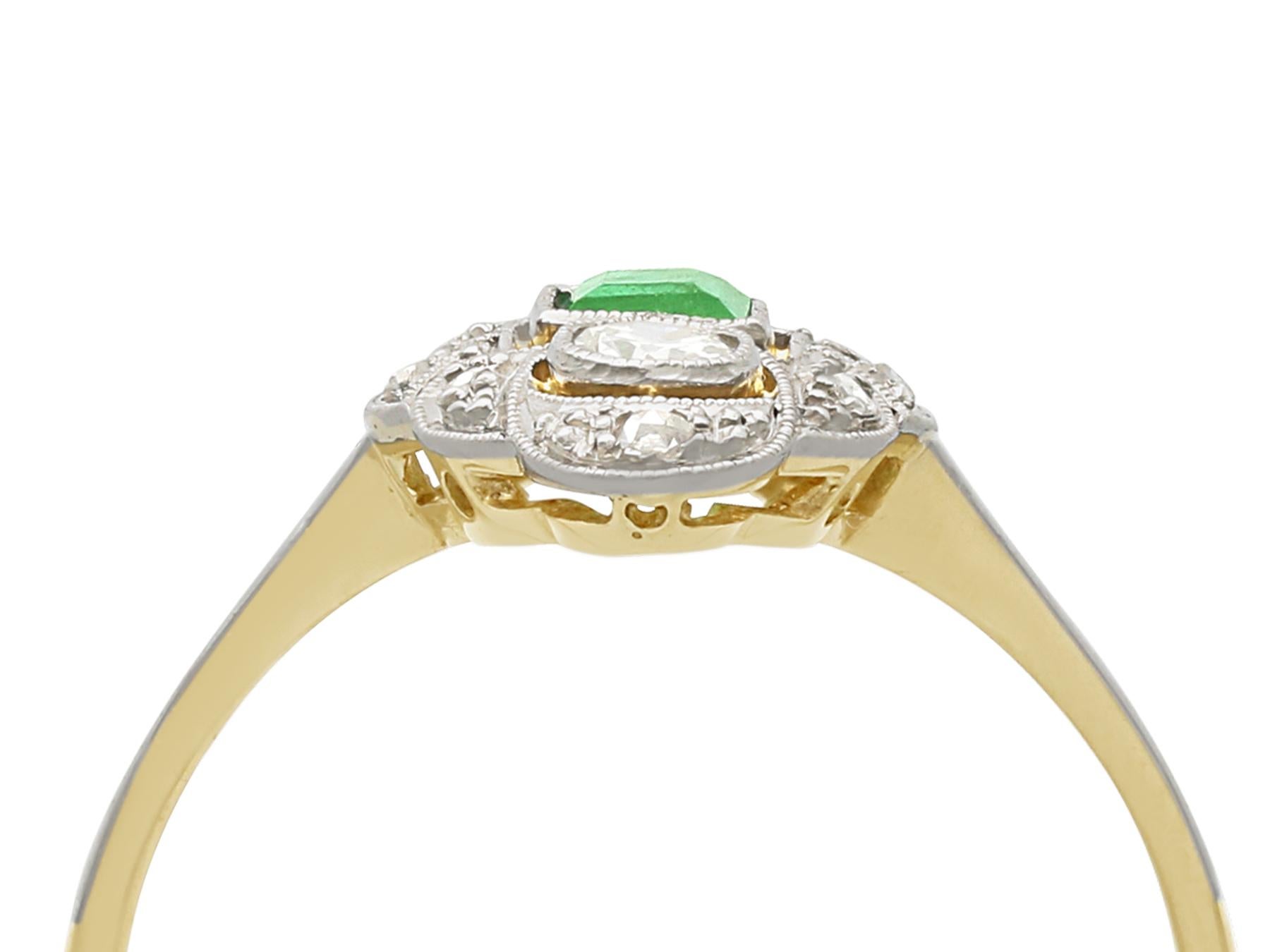 An impressive 0.25 carat emerald and 0.25 carat diamond, 14 karat yellow gold and 14 karat white gold set marquise shaped ring; part of our diverse vintage jewelry collections.

This fine and impressive marquise shaped emerald ring has been crafted