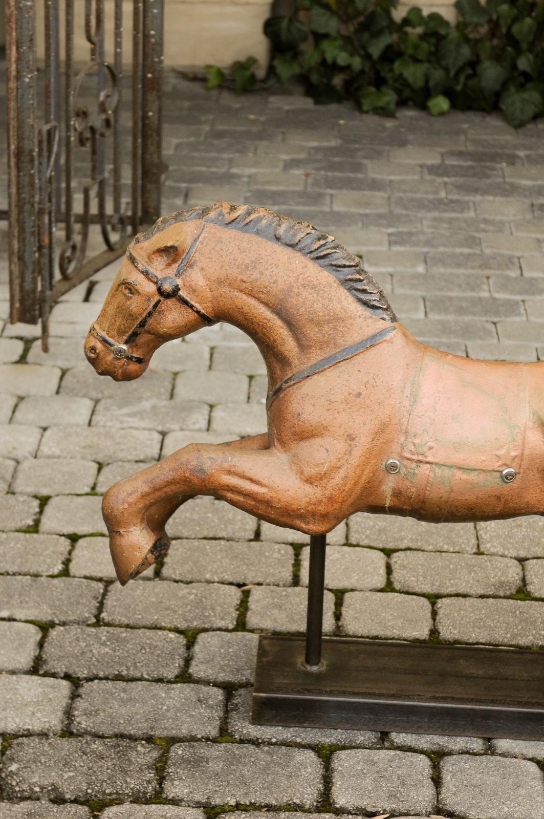 Vintage 1940s Folk Art Painted Iron Child Riding Horse Mounted on Custom Base For Sale 7