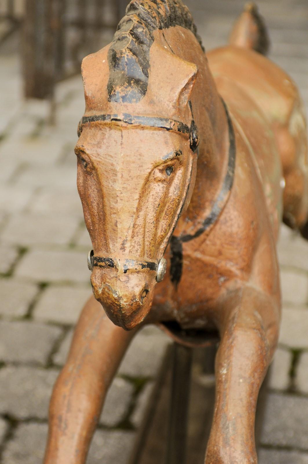 Vintage 1940s Folk Art Painted Iron Child Riding Horse Mounted on Custom Base For Sale 10