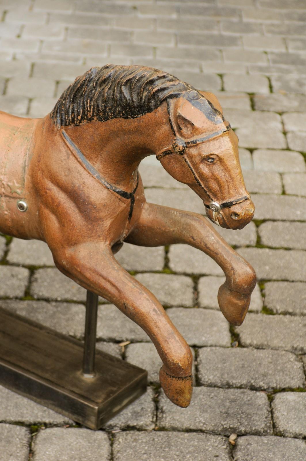 20th Century Vintage 1940s Folk Art Painted Iron Child Riding Horse Mounted on Custom Base For Sale