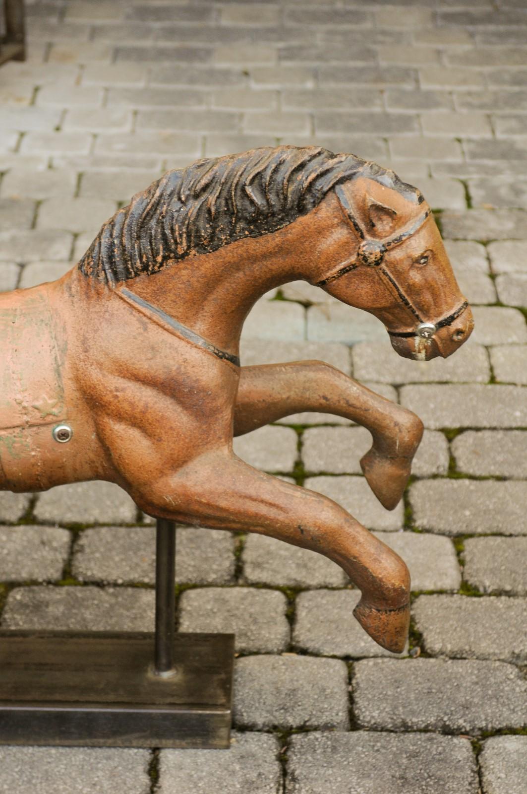 Vintage 1940s Folk Art Painted Iron Child Riding Horse Mounted on Custom Base For Sale 3