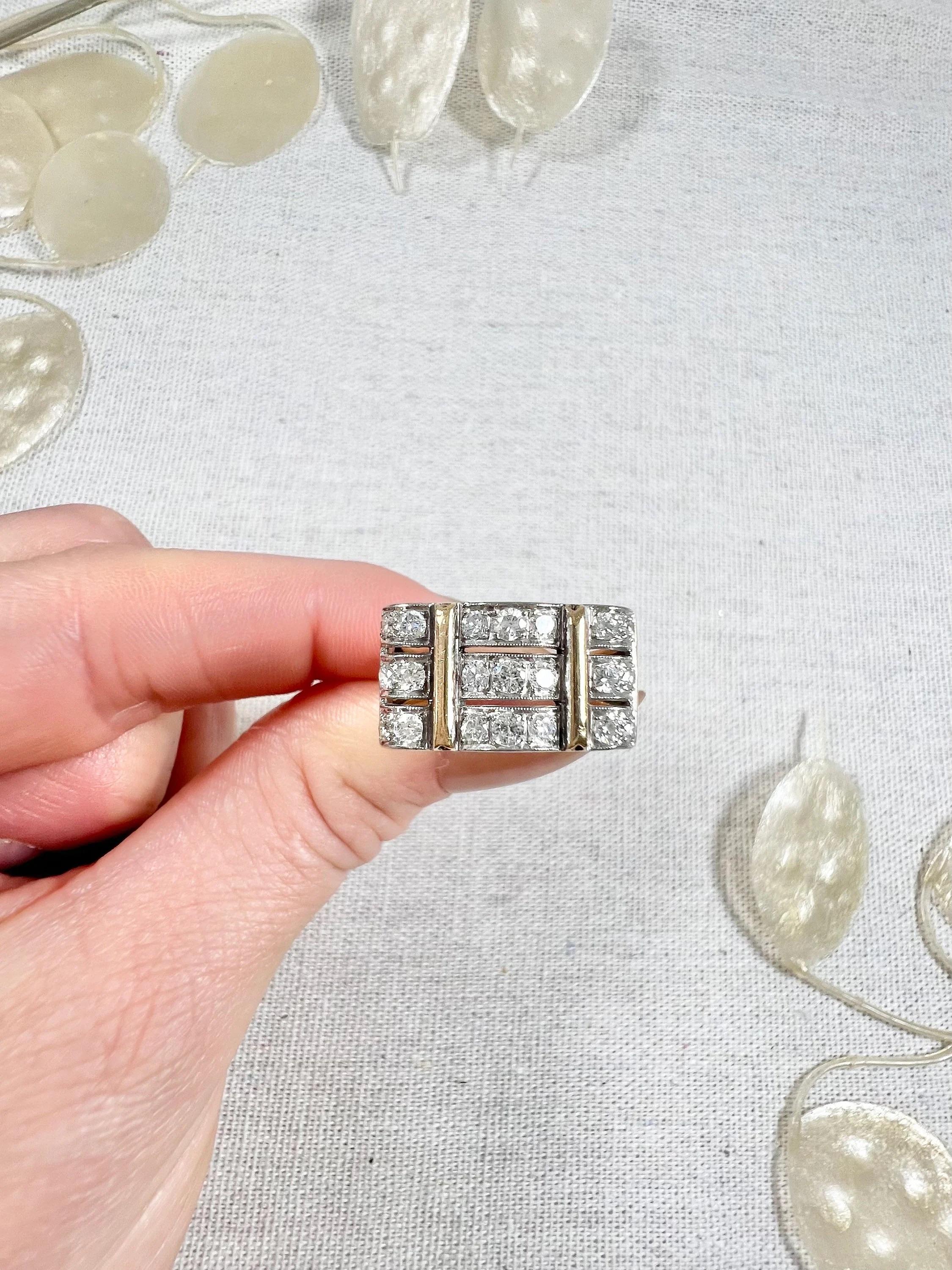 Vintage Cocktail Ring 

18ct Gold & Platinum French Hallmarked- slightly rubbed 

Circa 1940s

This exquisite cocktail ring is a true masterpiece that will capture your heart at a glance. The ring is made of 18ct yellow gold and platinum, and bears