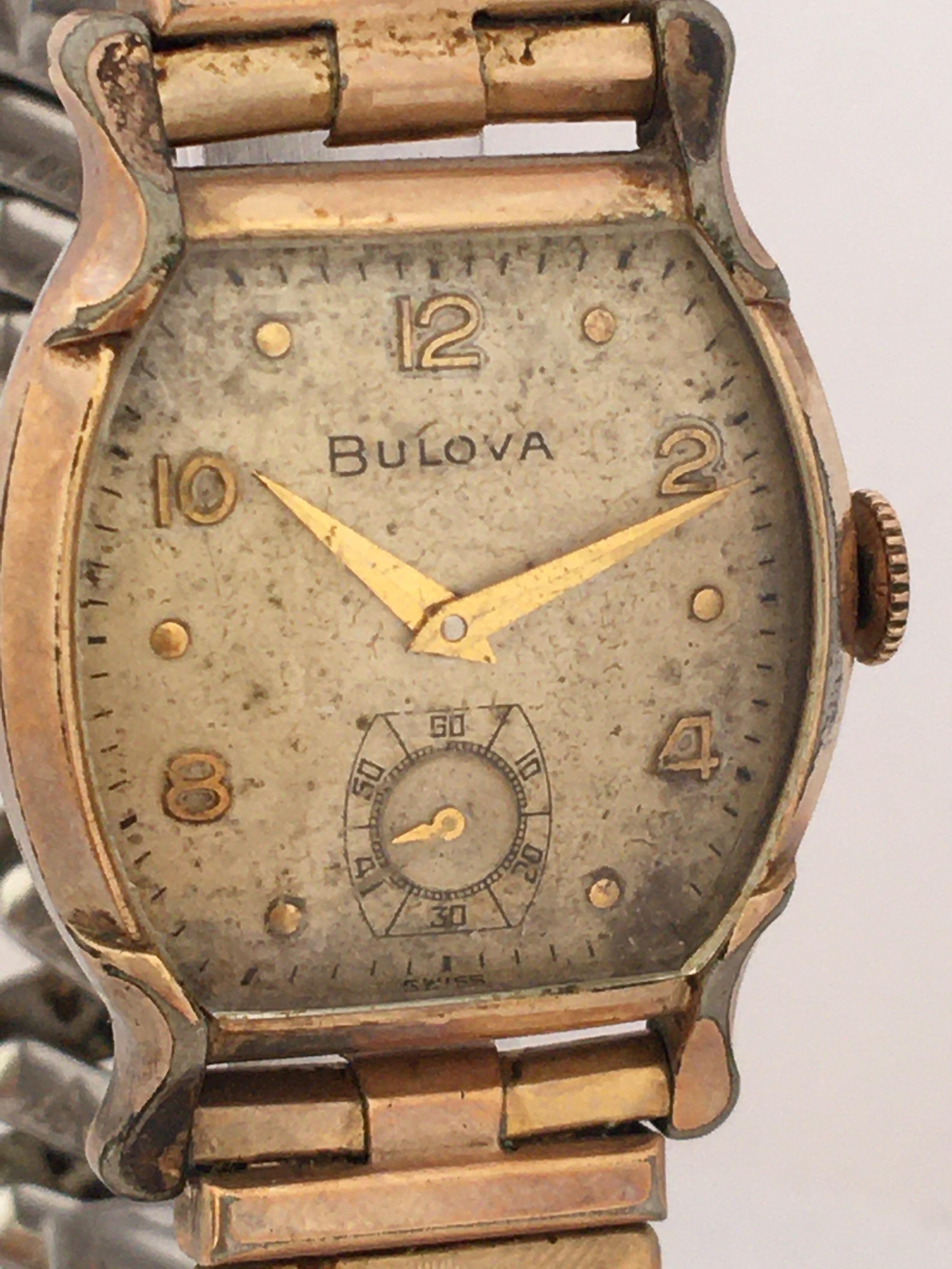 This beautiful vintage mechanical watch is working and it is ticking well. It has aged and tarnished. Tiny scratches on the glass and watch case as shown, the dial is a bit tired as aged. Measured 39mm long(lug to lug) and 35mm wide . the gold
