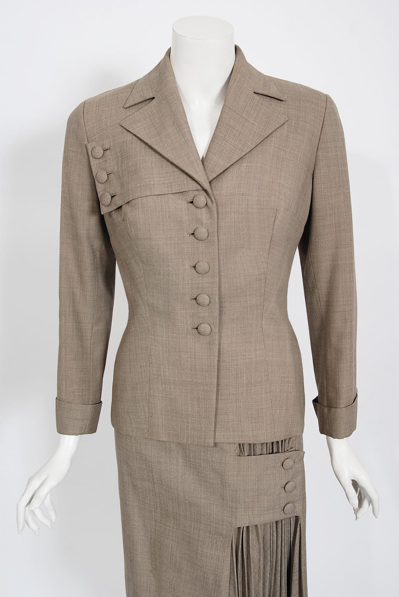 An elegant and ultra unique Irene Lentz documented suit dating back to the mid-1940's. Irene Lentz stunned the world in the 1930's, 40's and 50's with her ingeniously constructed, sophisticated, couture-standard garments. After charming Los Angeles