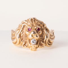 Vintage 1940s Lion Head Ring with Diamond and Red Gemstone Eyes in 14k Gold