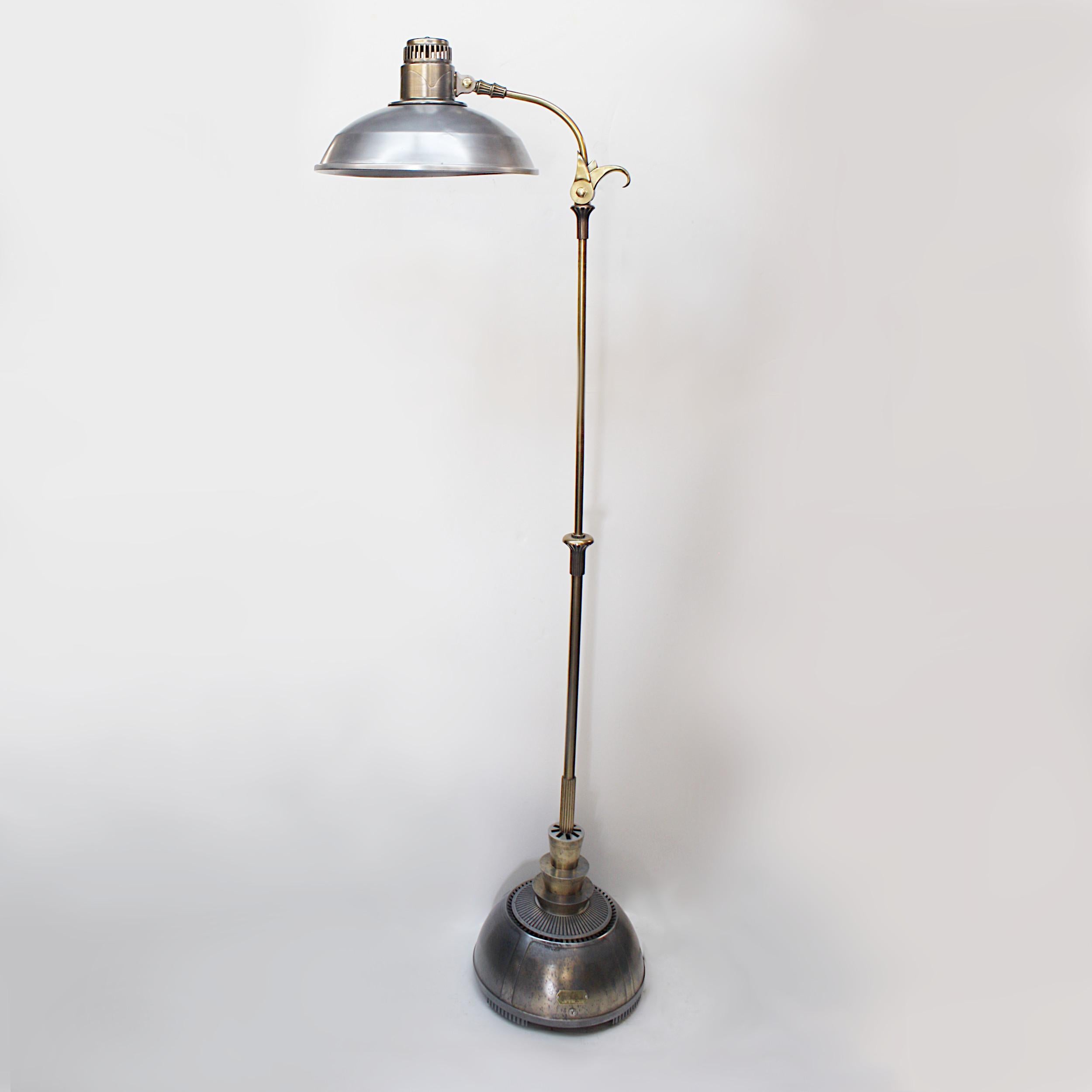 This rare and wonderful floor lamp began life as a 1940s GE Sunlamp, a device that claimed no true therapeutic or medical benefits but stated its purpose as a rather questionable 
