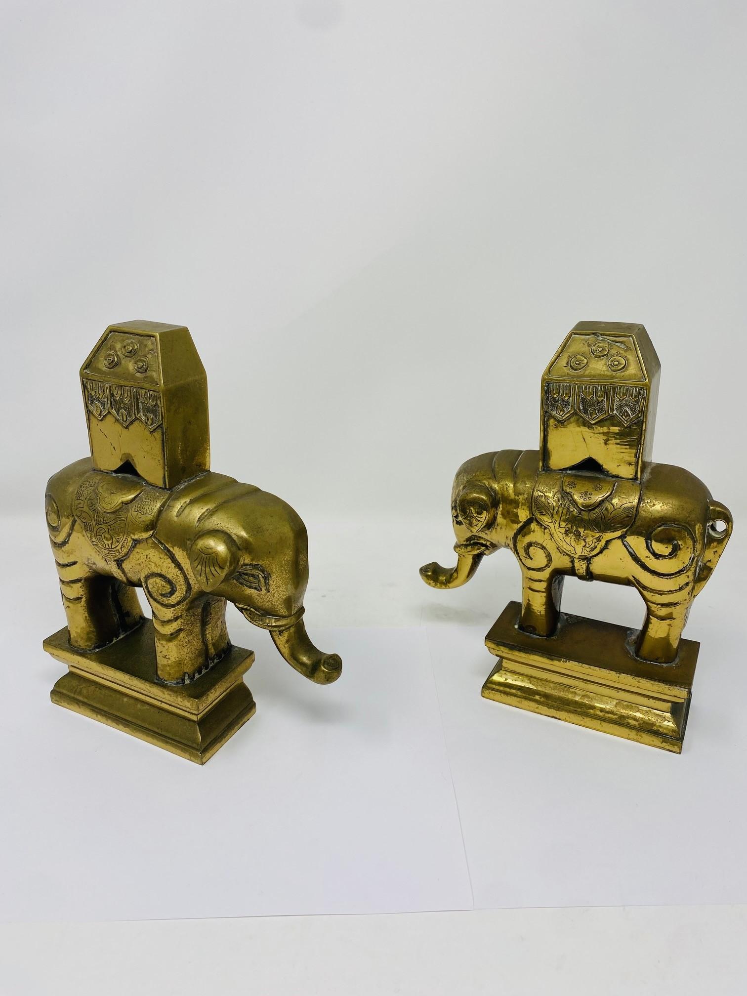 Beautiful and unique pair of sculptural elephant brass bookends.  This beautiful pair comes from the 1940s.  The solid sculpted pair weights 5.1 pounds each, making this pair not only incredibly beautiful but solid in presence.  Each piece is full