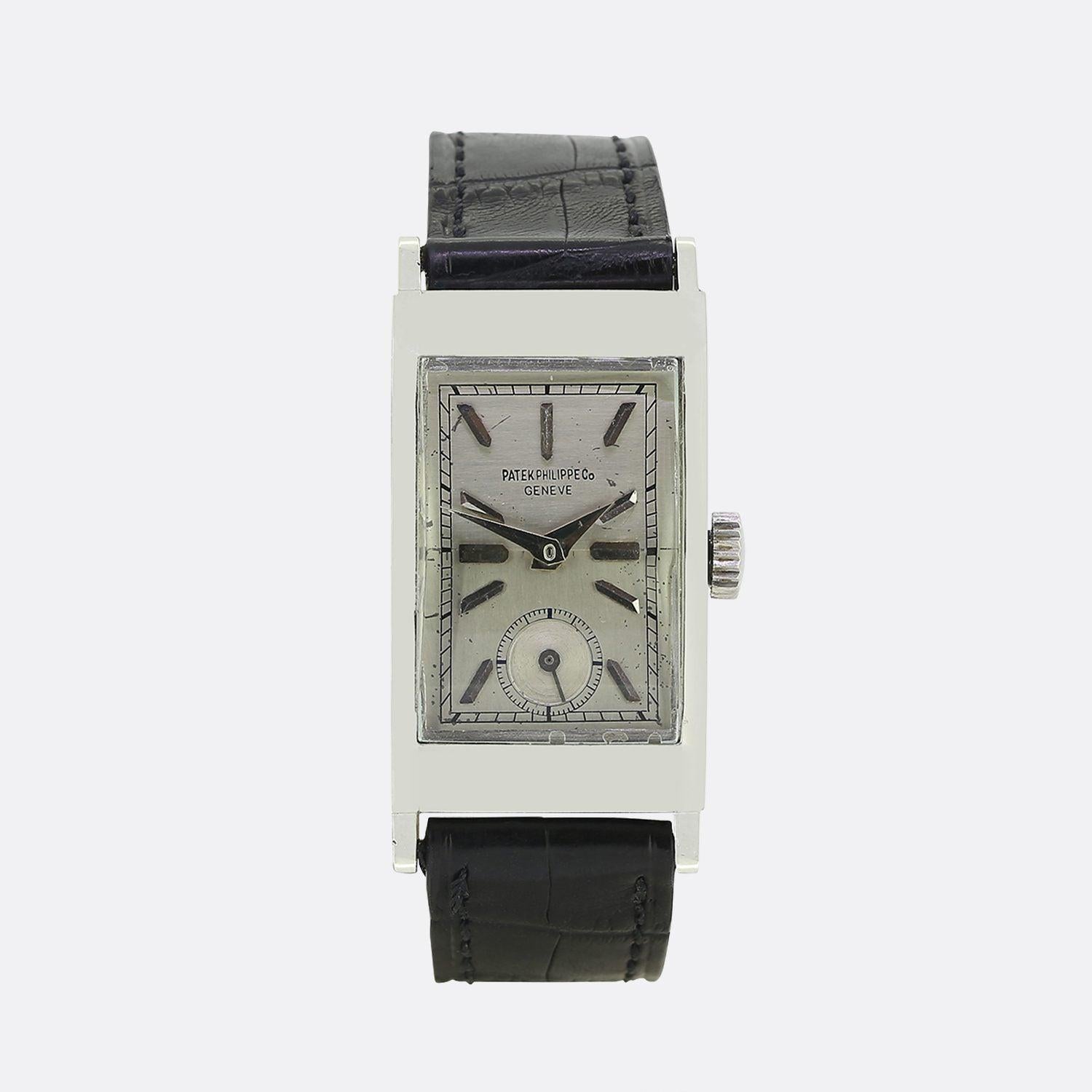 This is a wonderful and rare 1940s gents Patek Philippe wristwatch. The watch features a silver dial with white hour and minute hands and a seconds subdial at 6 o'clock. The watch has been finished with a new black leather strap and an 18ct gold