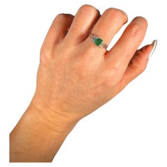 Vintage 1940's Platinum Emerald & Diamond Three Stone Ring on a decorative band