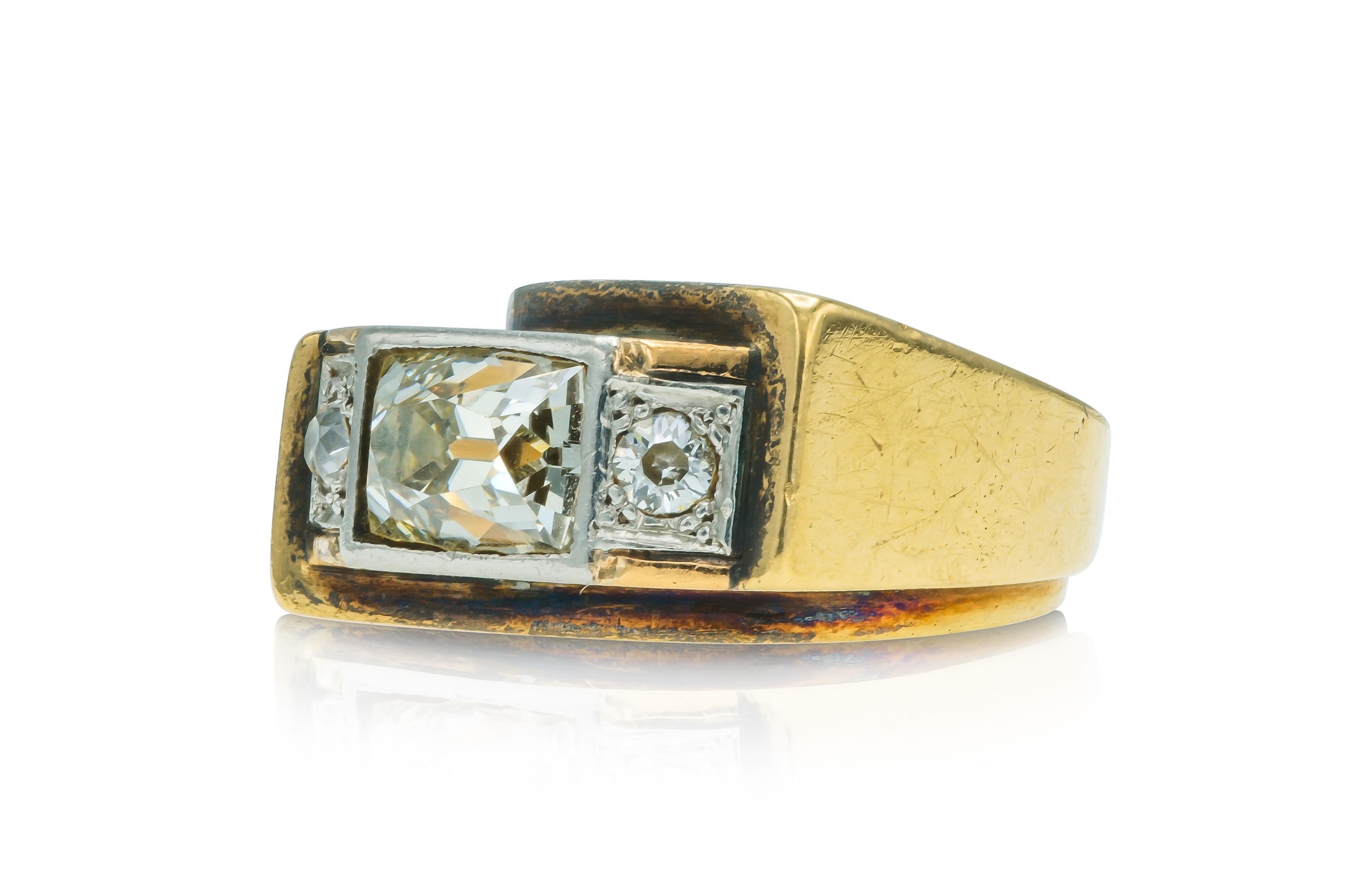 Finely crafted in 14k yellow gold with a French cut Diamond weighing approximately 1.20 carats.
The ring features two small Single cut side Diamonds.
Circa 1940s
Size 4 1/4, resizable