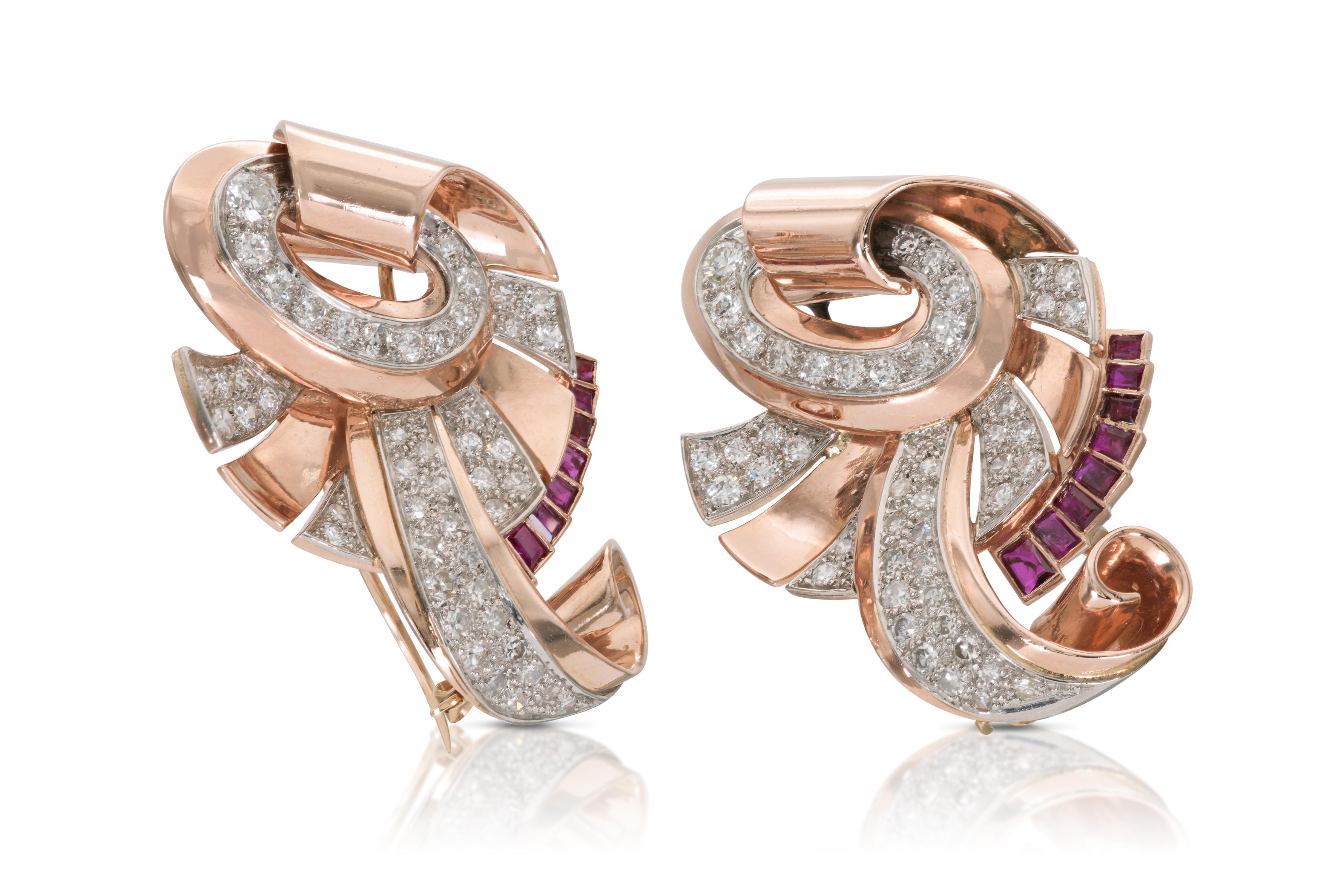 Finely crafted in 14k rose gold and platinum with Round brilliant cut Diamonds weighing approximately a total of 8.00 carats, and Baguette cut Rubies weighing approximately a total of 2.00 carats.
Circa 1940s
Individual clip: 2 x 1 3/8 inches