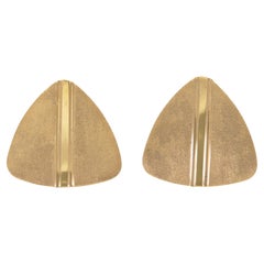 Gemelos triangulares retro dorados de los años 40