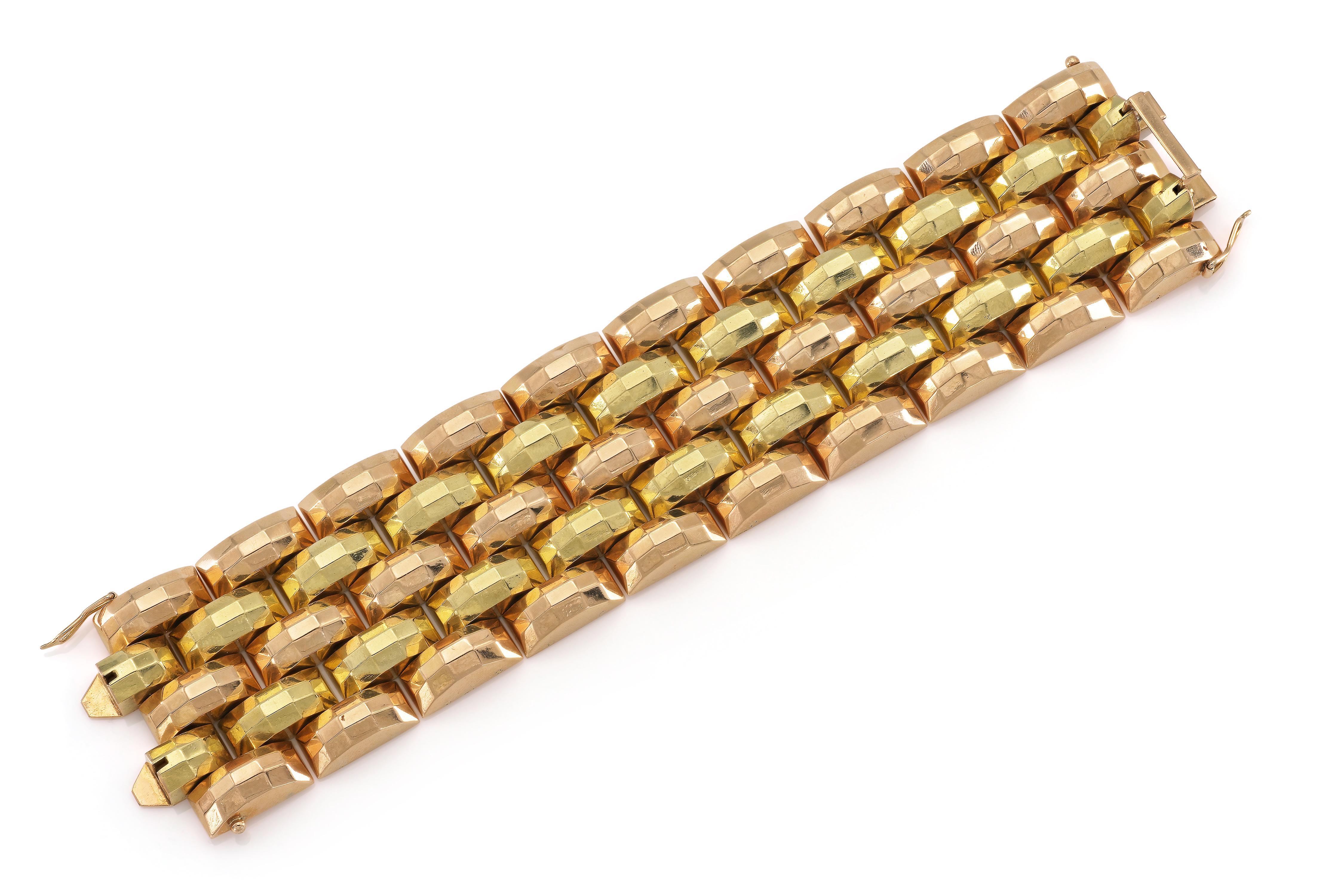 Finely crafted in 17.28k yellow and rose gold.
Circa 1940s
7 5/8 x 1 5/8 inches