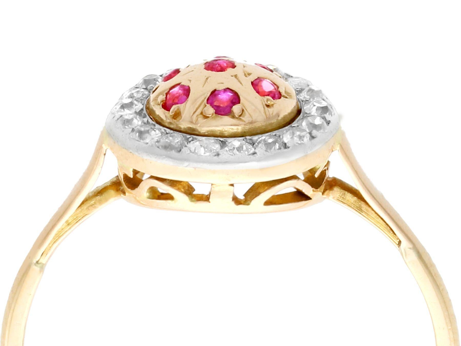 A fine 0.15 carat ruby and 0.30 carat diamond, 18 karat yellow gold and 18 karat white gold set cocktail ring; part of our diverse vintage jewelry collections.

This fine and impressive ruby and diamond cocktail ring has been crafted in 18k yellow