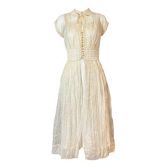 Vintage 1940s Robe en organza ivoire transparent avec taille en crochet et boutons en lucite