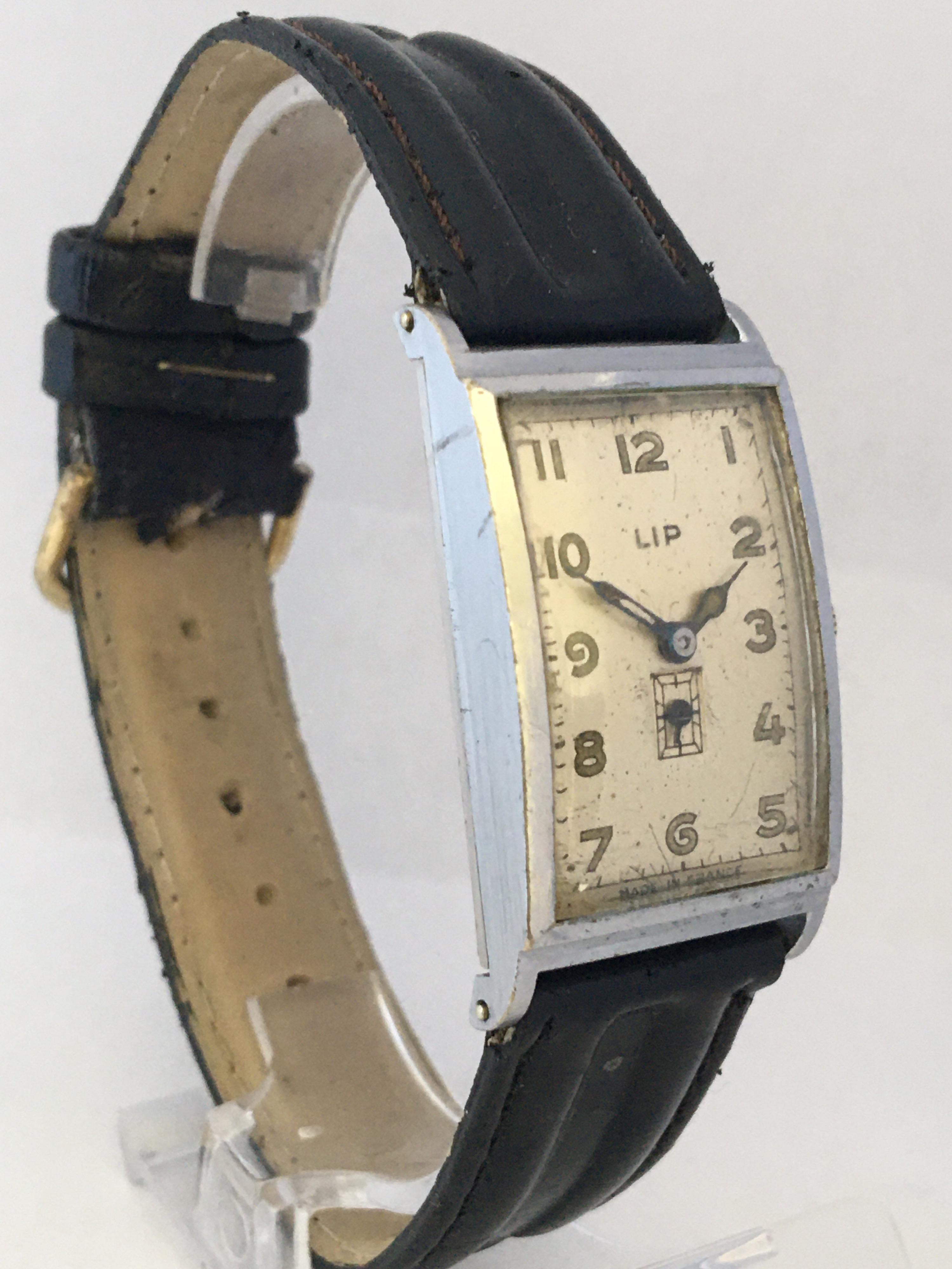 This beautiful pre-owned vintage watch is working and it is ticking well. Visible signs of ageing and wear with with scratches on the glass and watch case. Some tarnishes on the silver plated watch case and the winder. The watch strap is worn and