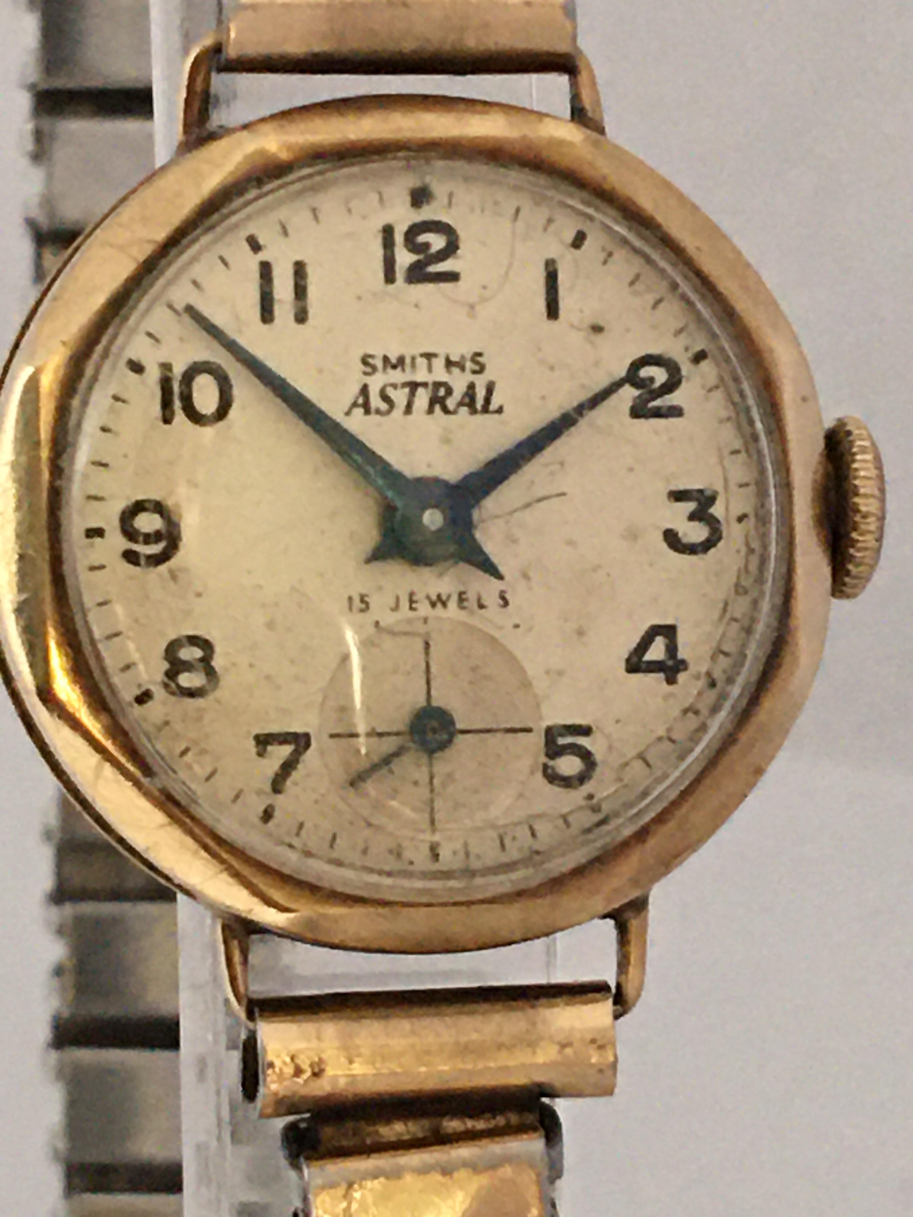 This beautiful pre-owned hand winding gold watch is working and it is ticking well.
Visible signs of ageing and wear with some scratches on the glass and the gold watch case. Tiny dents on the back cover case. There is a tiny crack on the glass
