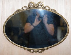 Vintage 1940's Solid Metal Framed Mirror with Ornate Casting of Ribbons & Beads