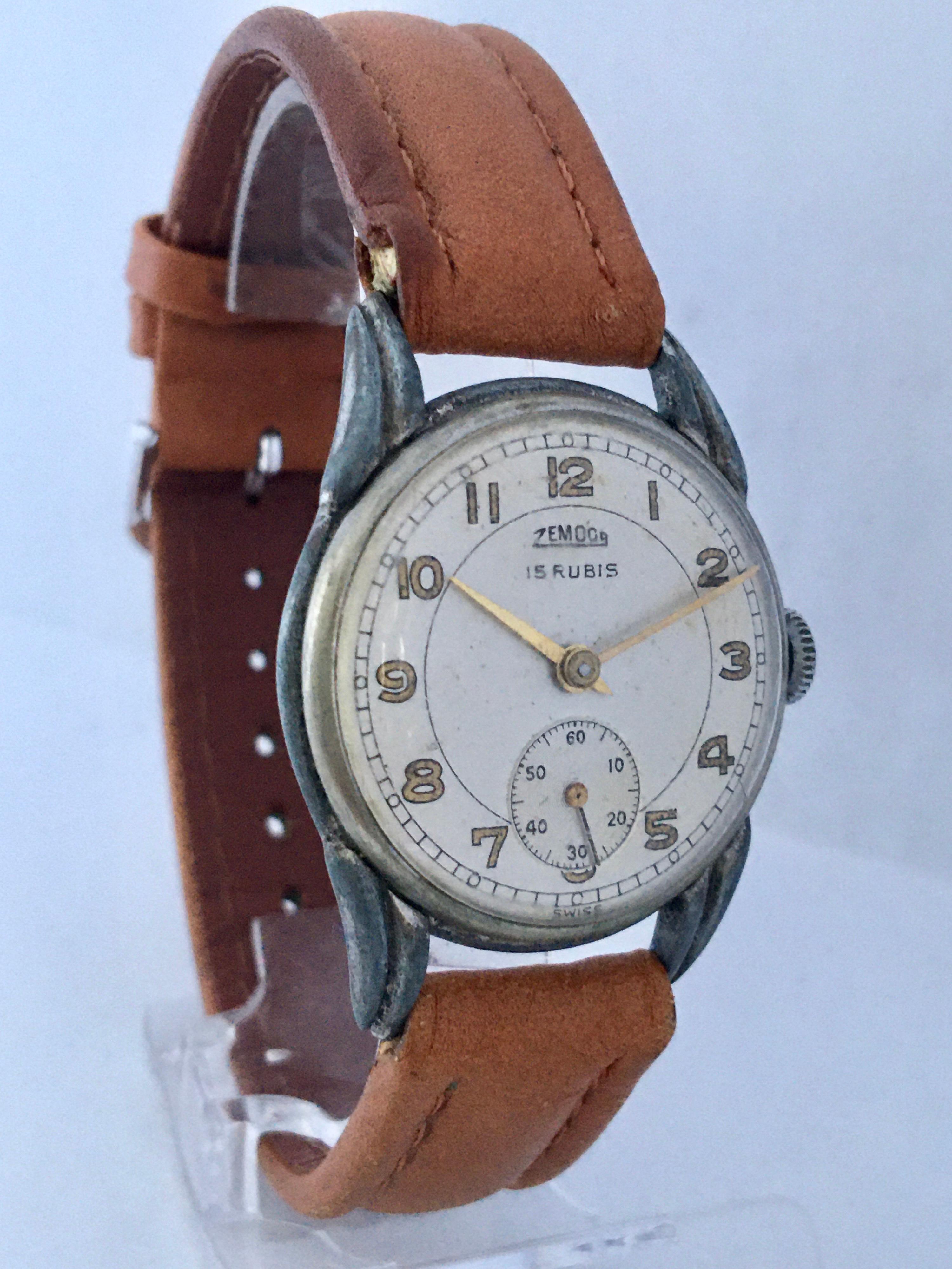 This beautiful pre-owned 30mm diameter vintage hand winding watch is in good working condition and it is ticking and running well. Visible signs of ageing and wear with light scratches and tarnishes on the silver plate watch metal case as