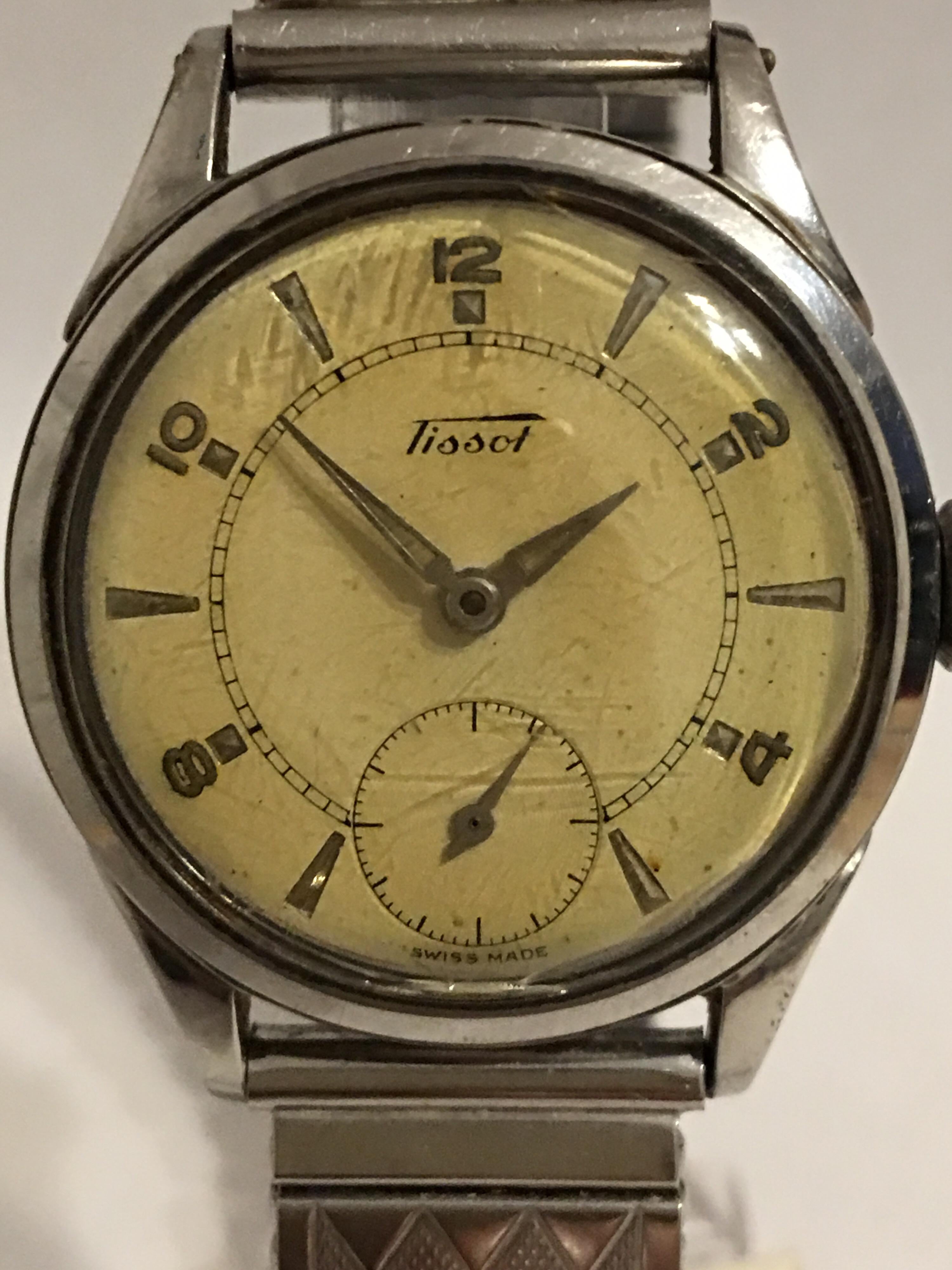 This manual winding watch is in good working condition and is ticking well. Visible cracks and scratches on the glass as shown. 
Please study the images carefully as form part of the description 