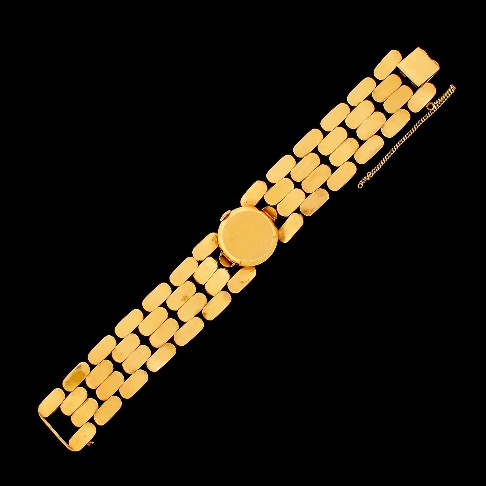 Exceptionally fine triple signed Omega Ladies 18k Pink Gold Retro-style Wristwatch. 
This vintage timepiece has an unusual 18k Swiss hallmarked pink gold integral bracelet., which was the epitome of high society fashion in the 1940's.
even though