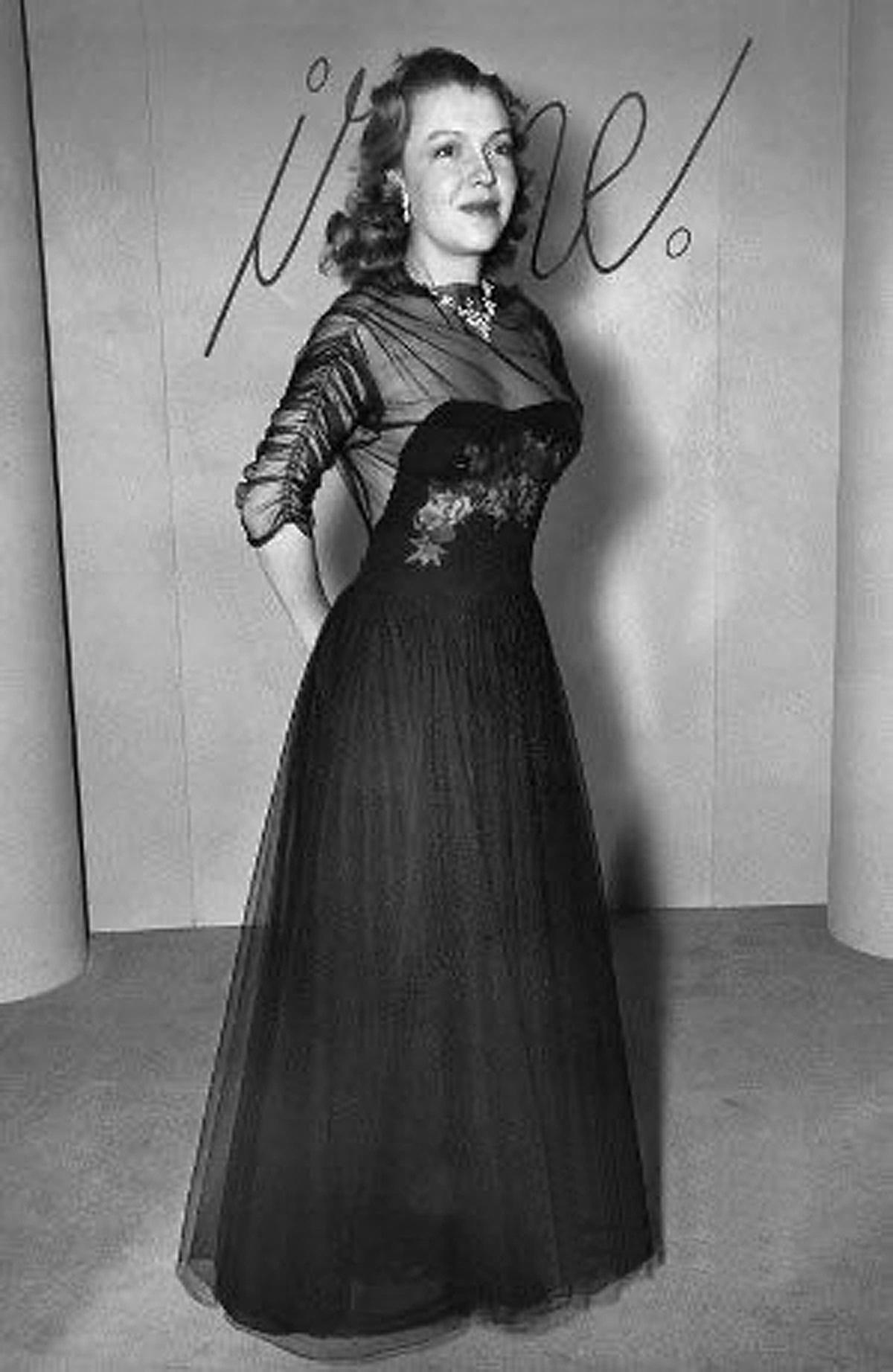 A seductive Irene Lentz documented designer dress dating back to 1945. Irene Lentz stunned the world in the 1930's, 40's and 50's with her ingeniously constructed, sophisticated, couture-standard garments. After charming Los Angeles society and