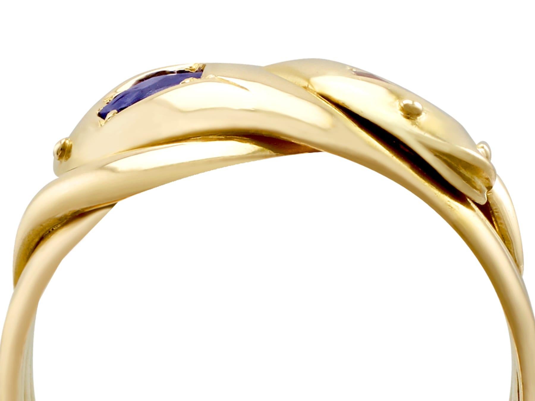 A fine and impressive vintage, 18 karat yellow gold snake ring; part of our diverse vintage jewelry and estate jewelry collections.

This exceptional vintage snake ring has been crafted in 18k yellow gold.

The ring has a substantial, multi-strand