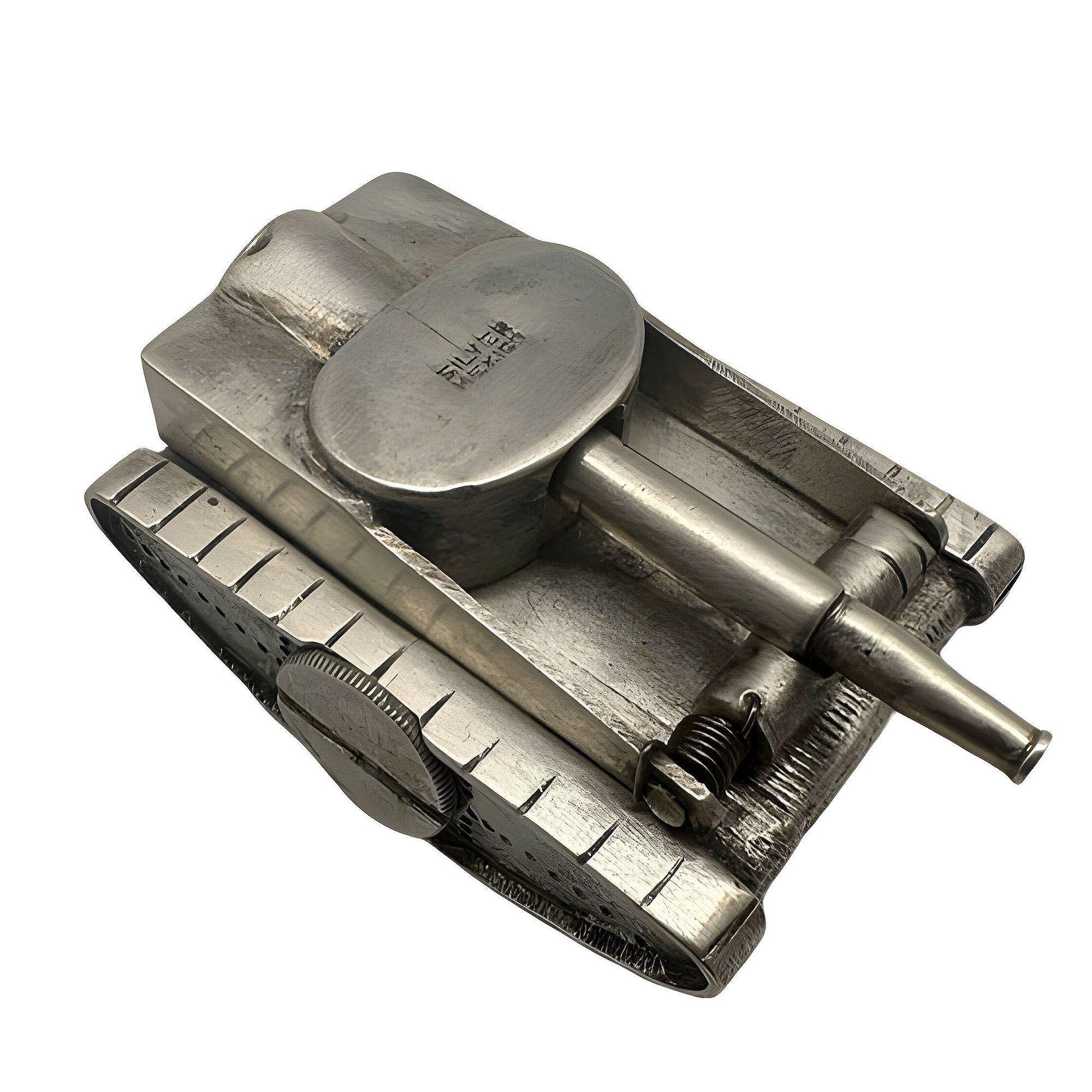 The original 1948 handmade boutique pocket lighter with an elongated tank shape reminiscent of the M4 Sherman Tank. The textured silver surface displays intricate ornate patterns, a testament to the meticulous craftsmanship and artistry of its