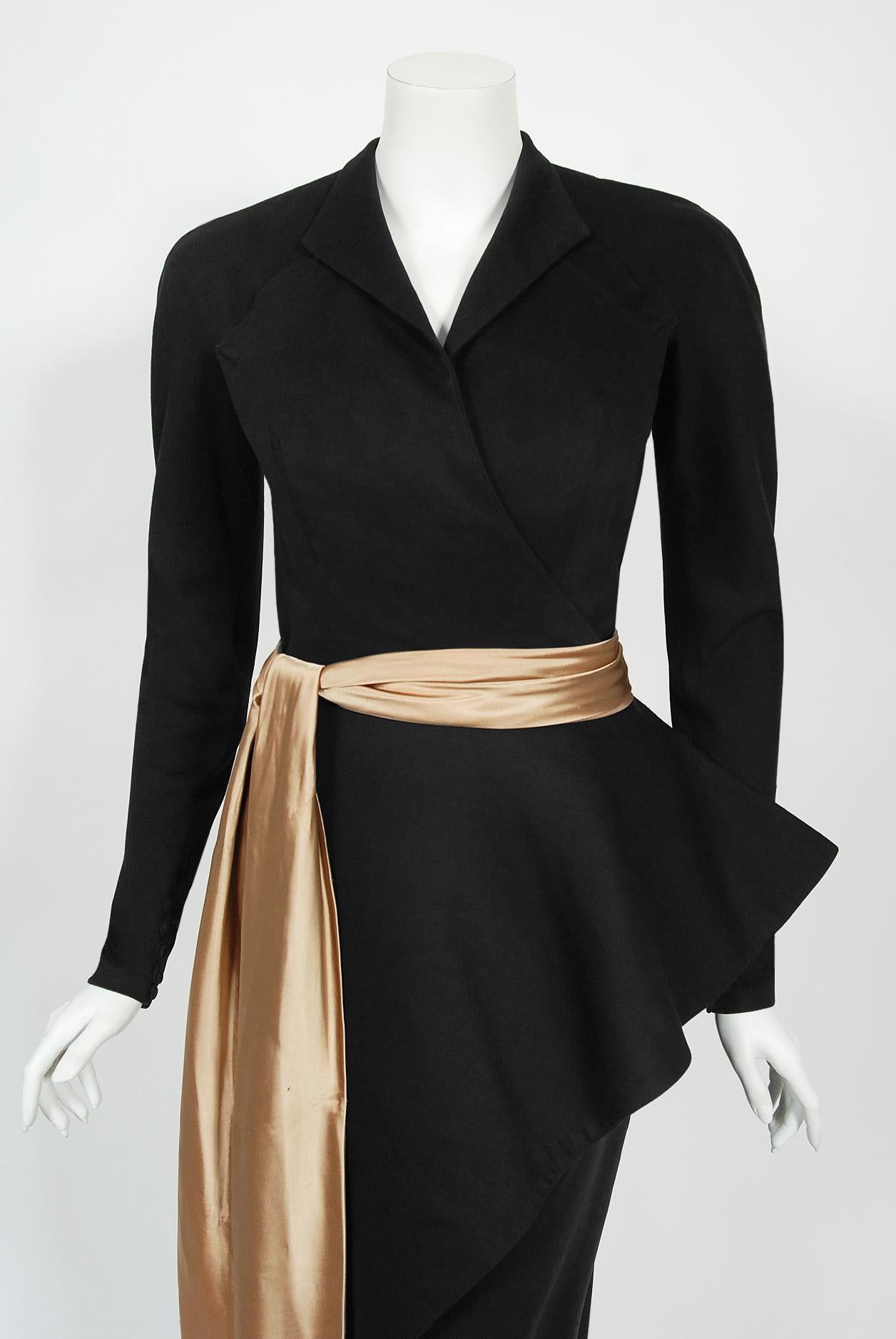 An incredibly gorgeous and well documented Jeanne Lanvin haute couture sculpted black wool cocktail dress dating back to the mid to fall-winter 1949. Lanvin was recognized for her innovative approach to fashion as well as for her fine craftsmanship.