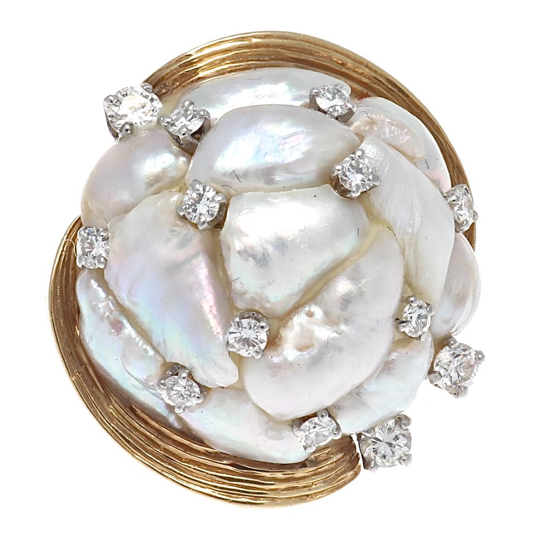 A study in exquisite form, this lustrous pearl and diamond gold ring from Ruser features Mississippi River pearls and near colorless diamonds to create a fantasy ring that looks as good as whipped cream tastes. This vintage beauty is a gift from the