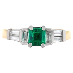 Vintage 1950s 0.60 Carat Emerald Cut Emerald Ring with Diamonds