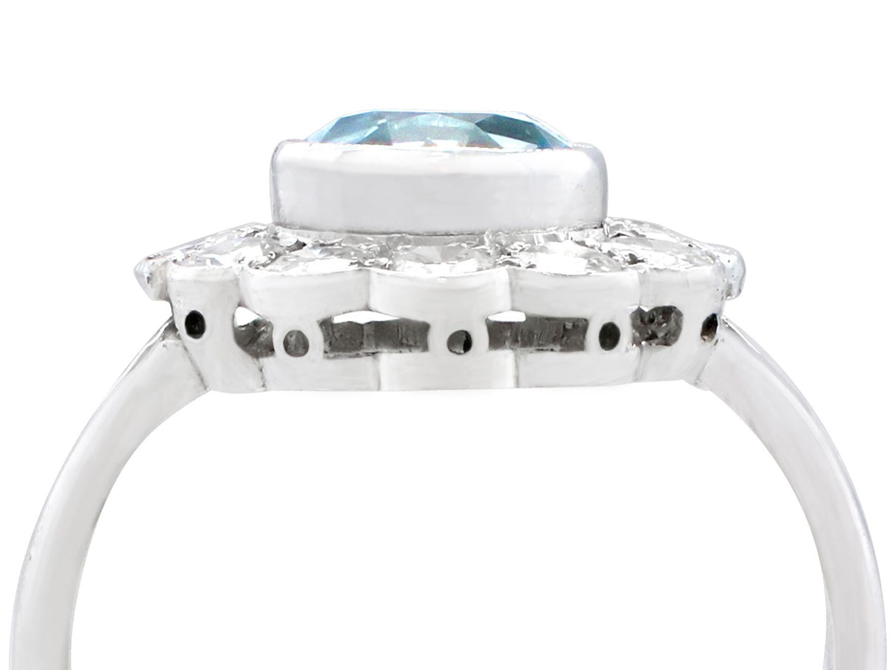 Round Cut 1950s 1.34 Carat Aquamarine and Diamond White Gold Cluster Ring For Sale
