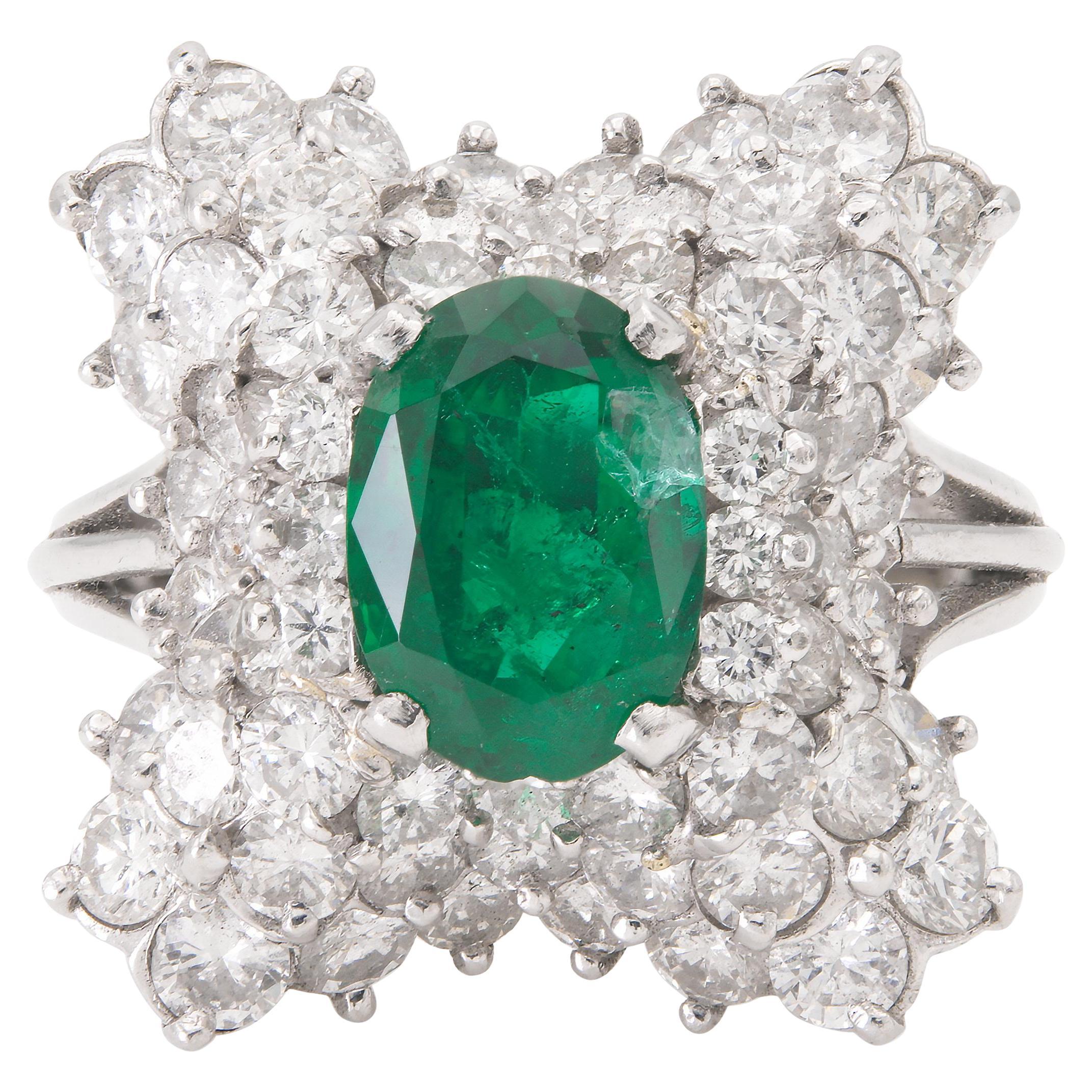 Vintage 1950s 1.38 Carat Oval Cut Emerald and 3.00 Carat Diamond Ballerina Ring