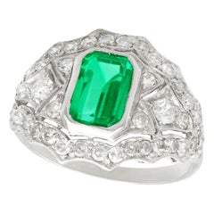 Vintage 1950s 1.49 Carat Emerald and 1.15 Carat Diamond Platinum Cocktail Ring