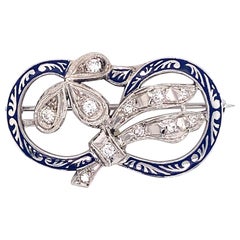 Spilla vintage anni '50 in oro bianco 14k con diamanti e smalto blu