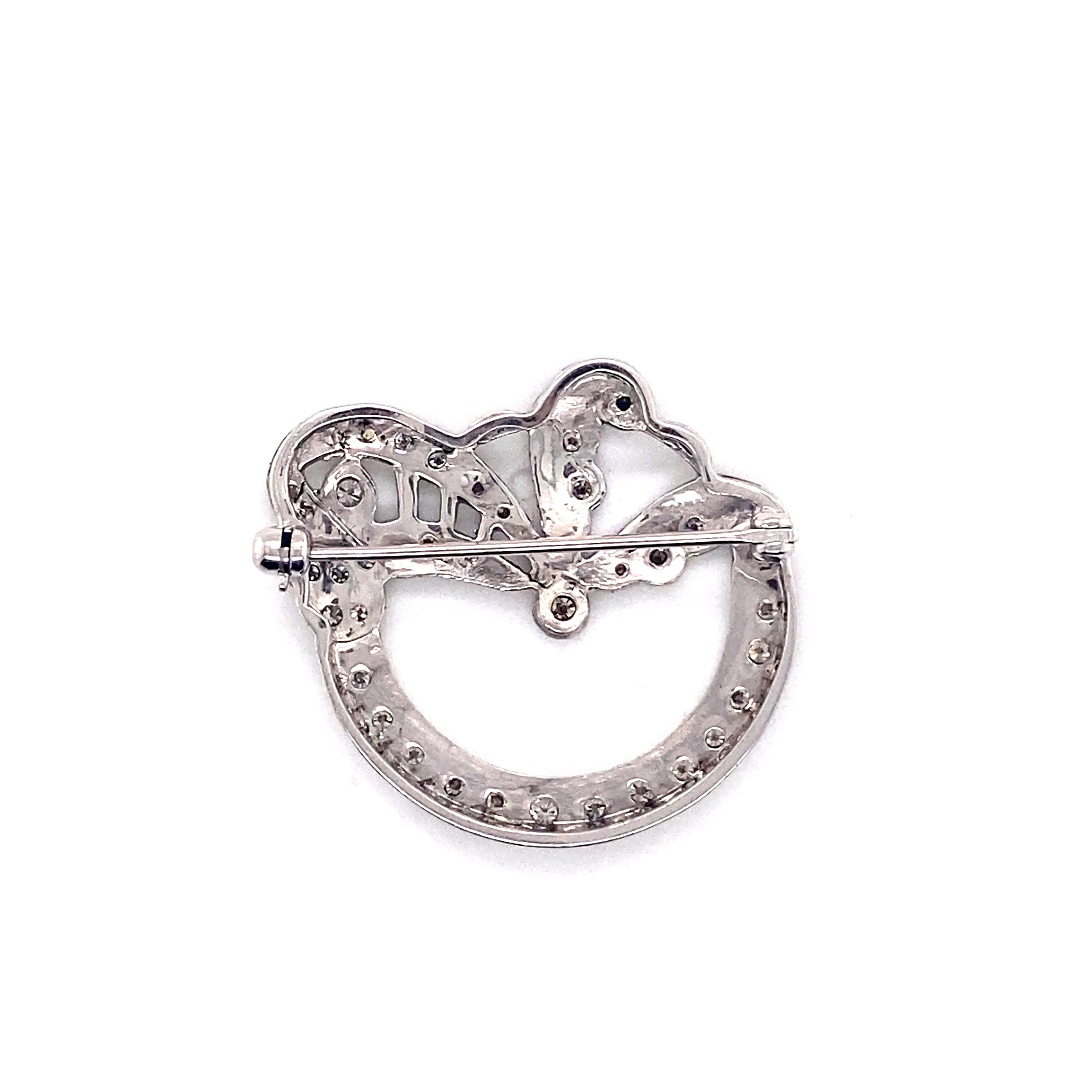 Vintage 1950’s 14k white gold diamond wreath pin - The pin is set with 35 round diamonds that weigh approximately .50ct. The diamond quality is H - I color, and VS2 - SI1 clarity. The pin measures 1.13in in diameter and weighs 4.91g