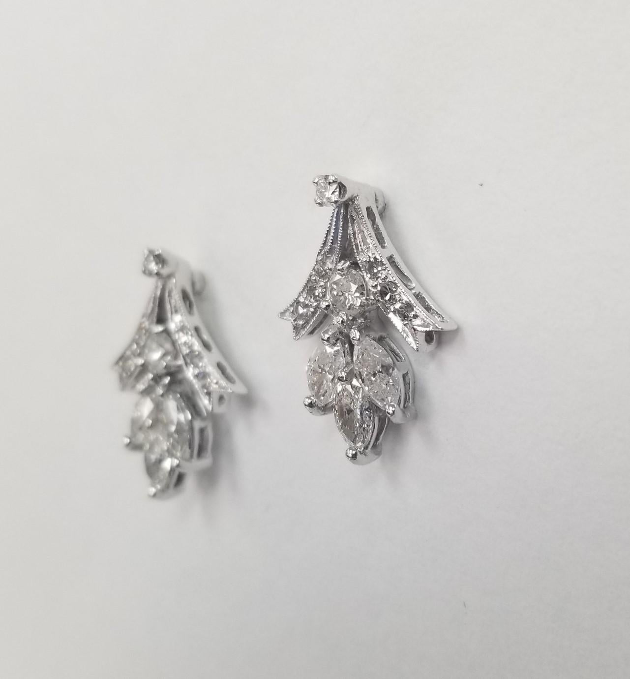 Vintage 1950's 14k White Gold Round and Marquise Cut Diamond Earrings
SPECIFICATIONS:
MAIN STONE:16 PCS single cut round diamonds 
SIDE STONE:6 PCS Marquise Cut
CARAT TOTAL WEIGHT:APPROXIMATELY 2.26