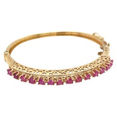 Bracelet jonc vintage en or jaune 14 carats et rubis, années 1950