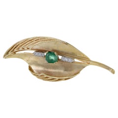 Vintage 1950s 14KT Yellow Gold Emerald And Diamond Leaf Brooch