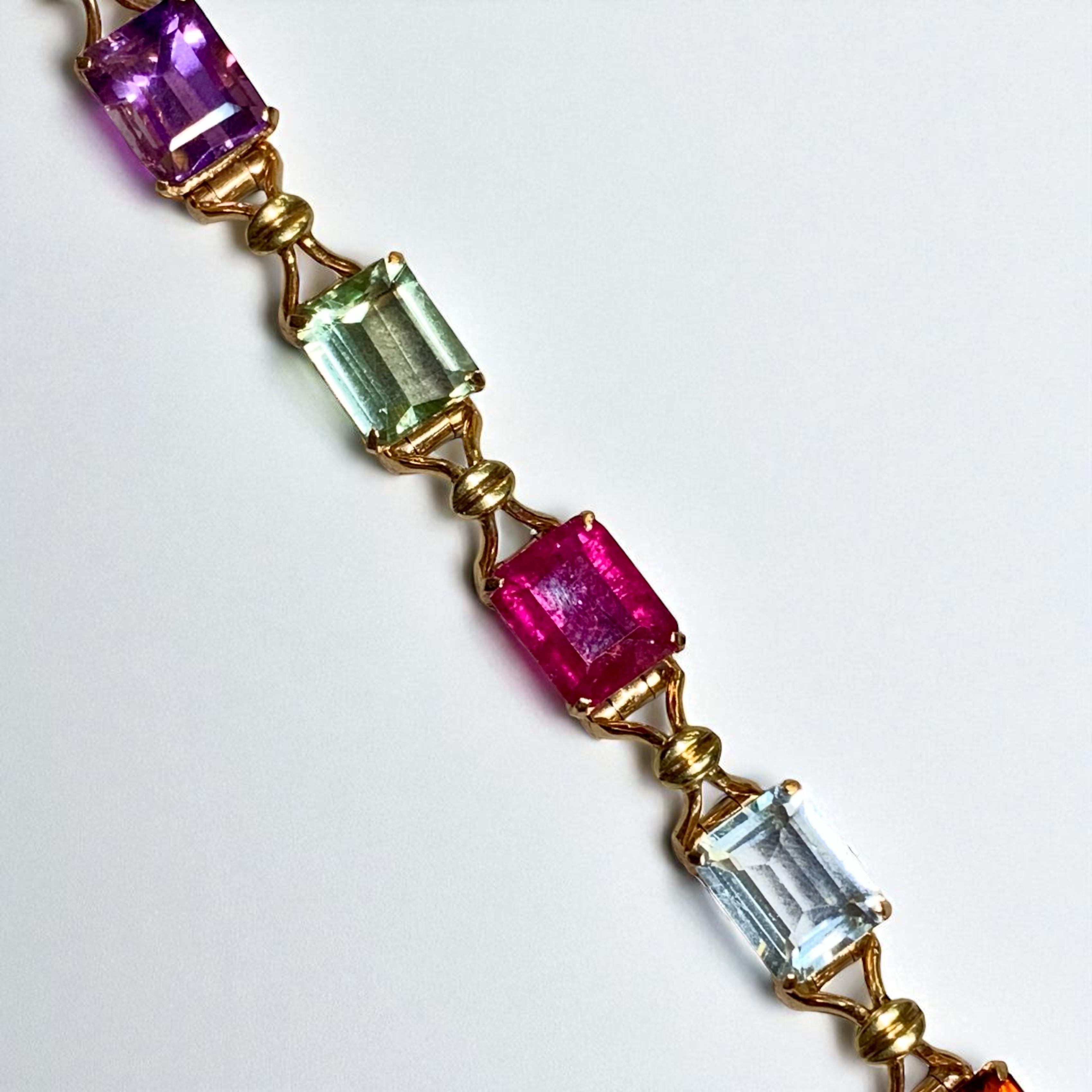 Bracciale vintage anni '50 in 18 carati con tormalina, acquamarina, ametista e pietre preziose 40ctw in vendita 6