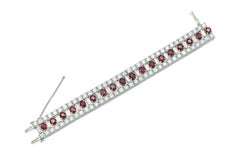 Vintage 1950s 20.00 Carat Oval Cut Rubies and 23.20 Carat Diamond Bracelet