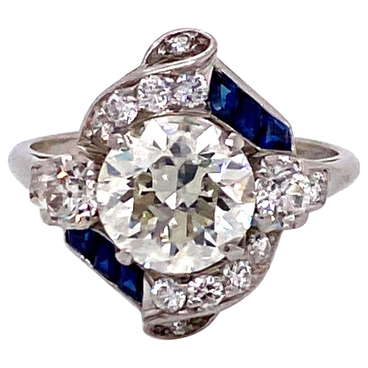 Bague vintage des années 1950 avec diamant rond de 2,10 carats, saphirs et diamants